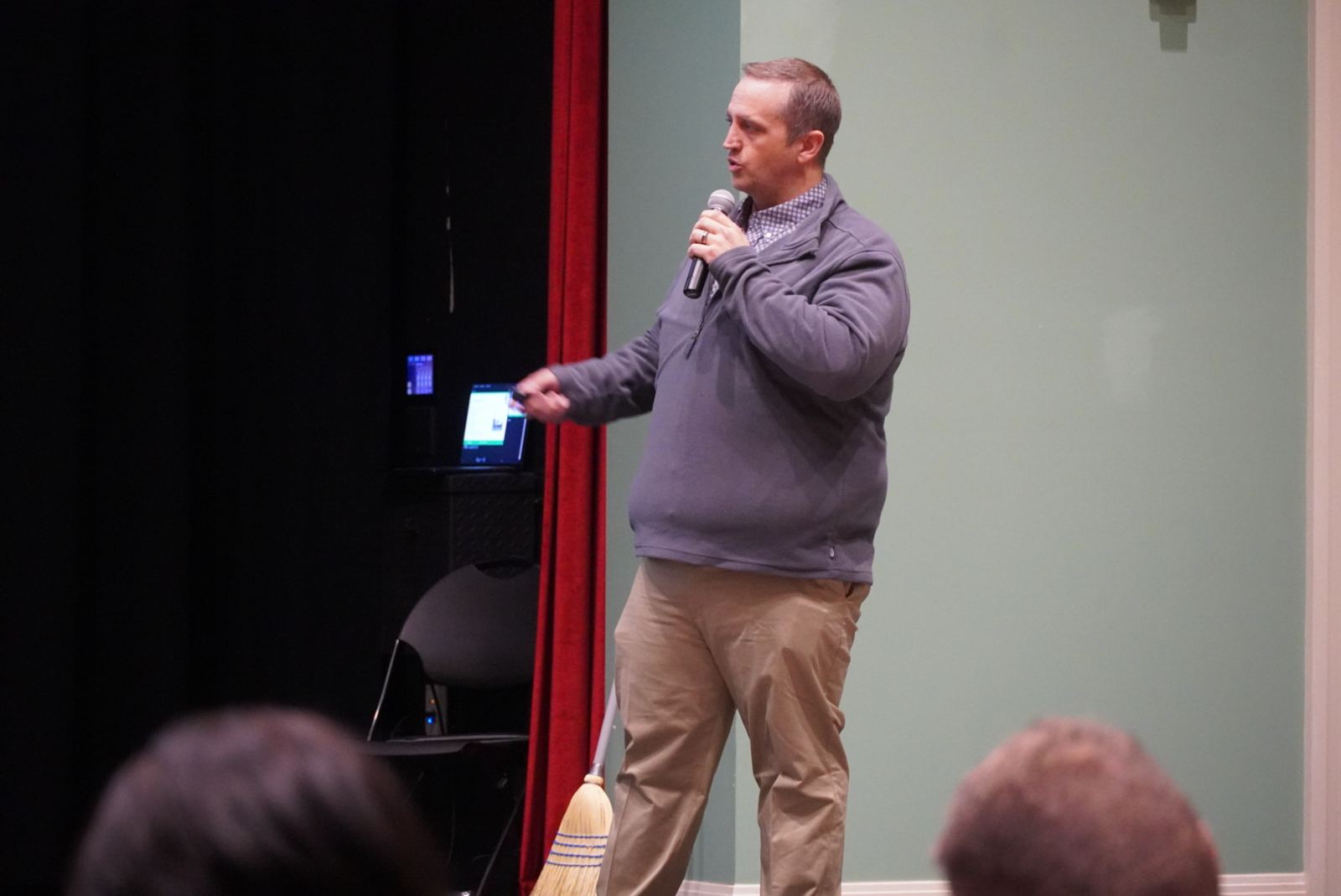 A presenter speaking to the audience at Pitch Night 2023